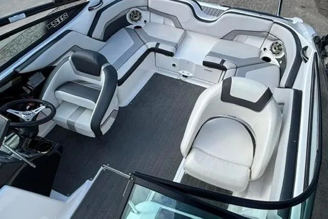 Slide: The Image of 2016 Yamaha Boats 212X interior with sleek seating and modern design. - 14