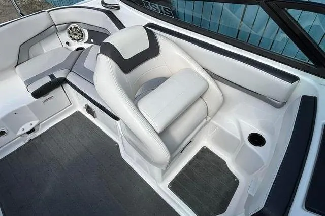 Slide: The Image of 2016 Yamaha Boats 212X interior with sleek seating and modern design. - 17
