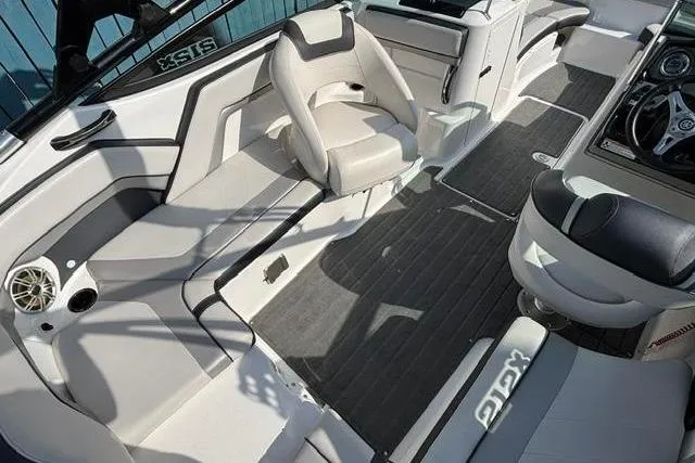 Slide: The Image of 2016 Yamaha Boats 212X interior with sleek seating and modern design. - 26