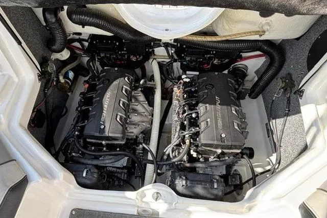 Slide: The Image of 2016 Yamaha Boats 212X engine compartment showcasing dual high-performance engines. - 31