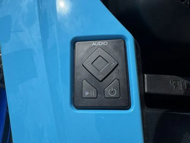 Slide: The Image of Close-up of 2023 Yamaha WaveRunner GP1800R audio control buttons. - 15