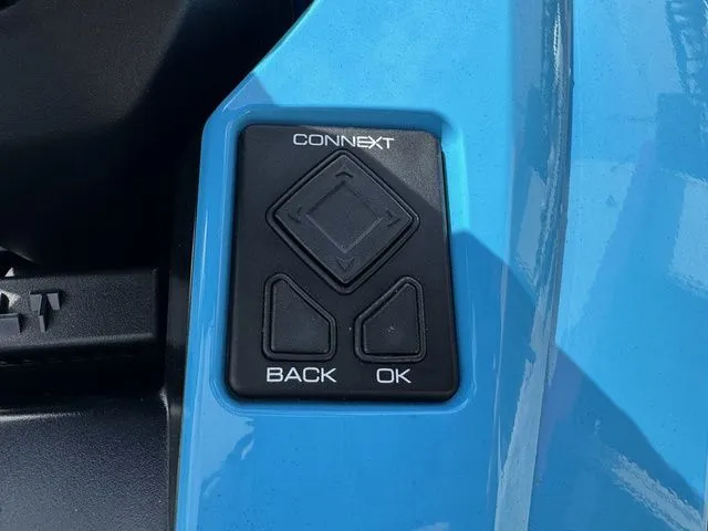 Slide: The Image of Close-up of Yamaha WaveRunner GP1800R 2023 Connex control buttons. - 16