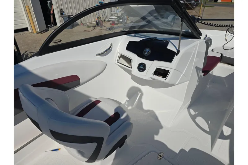 Slide: The Image of Interior of a 2020 Tahoe 500 TF boat with modern dashboard and seating. - 11