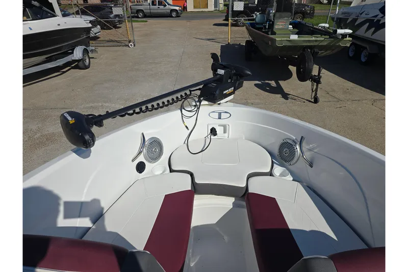 Slide: The Image of 2020 Tahoe 500 TF boat interior with trolling motor and seating area. - 12