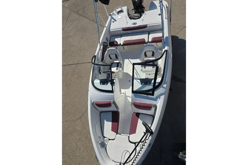 Slide: The Image of 2020 Tahoe 500 TF boat with white and maroon seating, viewed from above. - 8