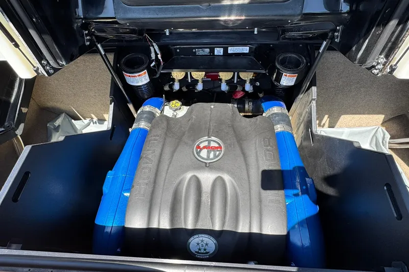 Slide: The Image of Engine compartment of a 2021 MasterCraft X26 boat, featuring an Ilmor engine. - 15