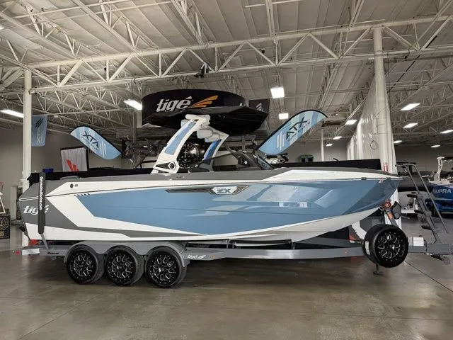 The Image of 2024 Tigé Ultré 25ZX boat in showroom. - 1