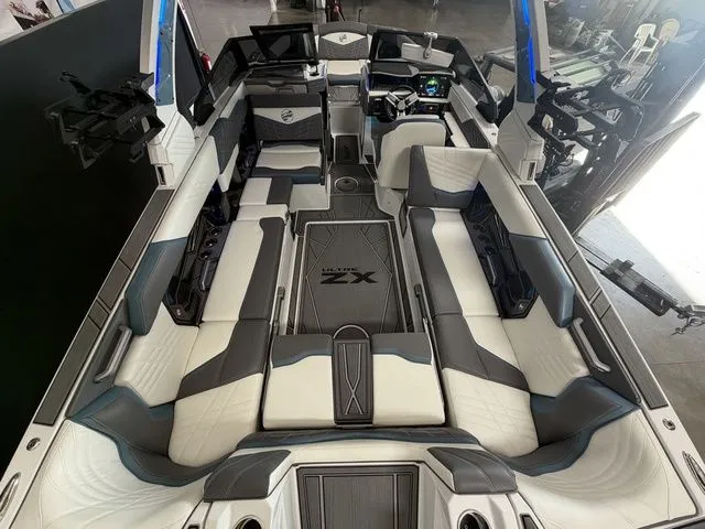 Slide: The Image of Interior of 2024 Tigé Ultré 25ZX boat, luxurious design. - 10
