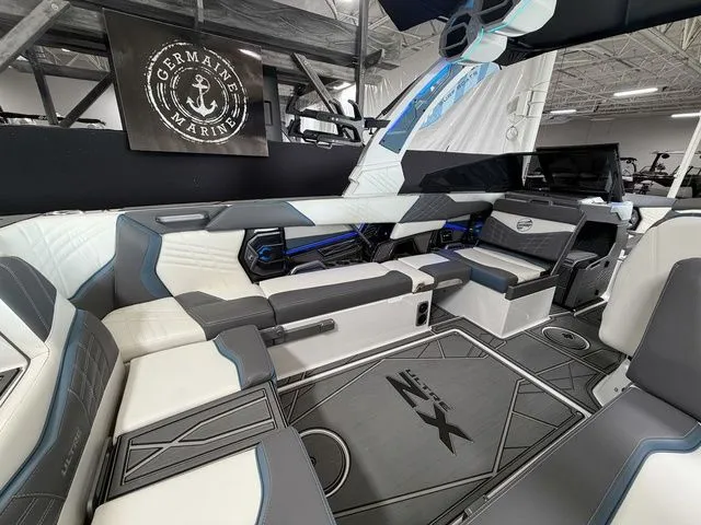 Slide: The Image of Interior of 2024 Tigé Ultré 25ZX boat, luxurious design. - 11