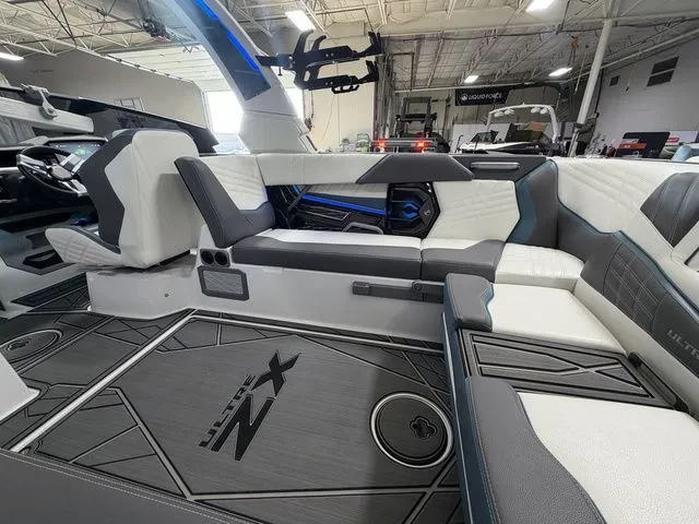 Slide: The Image of Interior of 2024 Tigé Ultré 25ZX with luxurious seating. - 12