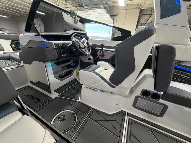 Slide: The Image of Interior of 2024 Tigé Ultré 25ZX boat, modern design. - 14