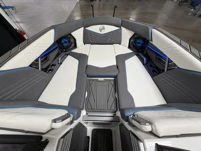 Slide: The Image of Interior of 2024 Tigé Ultré 25ZX boat with luxurious upholstery. - 18