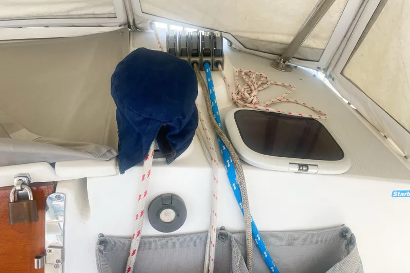 Slide: The Image of Interior view of a 2004 Catalina 42 MkII sailboat with ropes and hatch. - 18