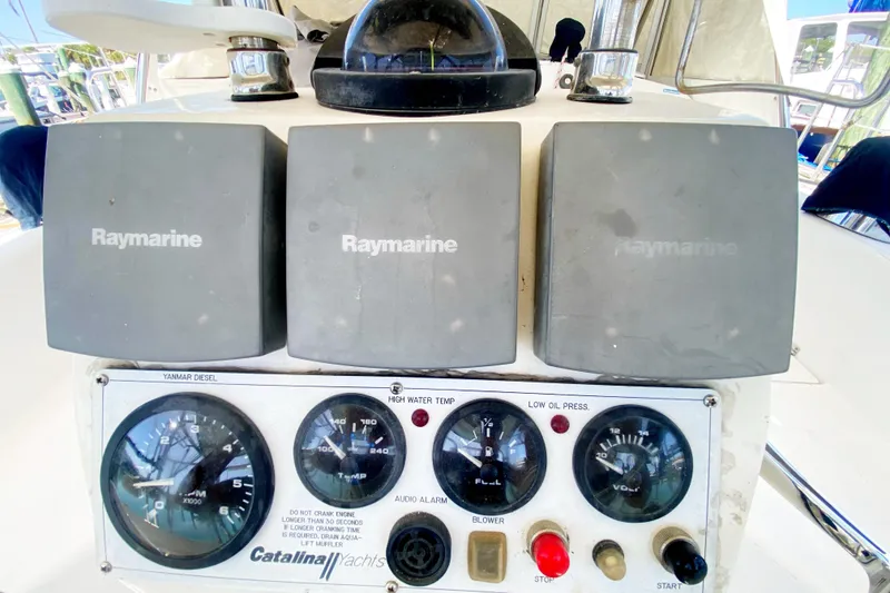 Slide: The Image of Control panel of a 2004 Catalina 42 MkII yacht with Raymarine equipment. - 13