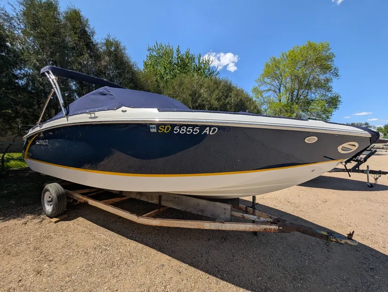 The Image of 2016 Cobalt R3 boat parked on trailer outdoors. - 1