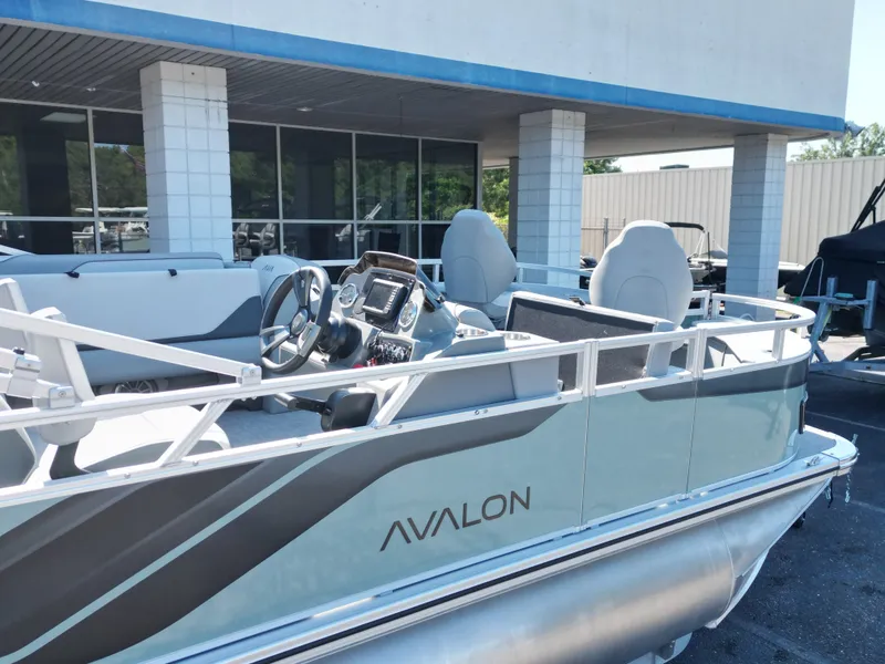 Slide: The Image of 2026 Avalon Venture 85 Quad Fish boat, side view outdoors. - 10