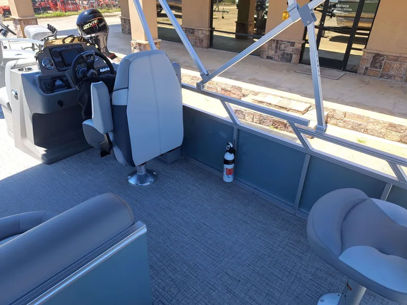 Slide: The Image of Interior of 2026 Avalon Venture 85 Quad Fish with helm console. - 23
