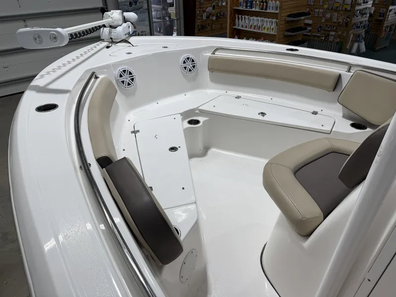 Slide: The Image of Interior view of a 2019 Tidewater 210 LXF boat with seating area. - 15