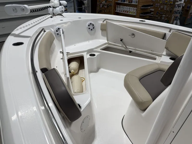Slide: The Image of Interior view of a 2019 Tidewater 210 LXF boat with seating area. - 16