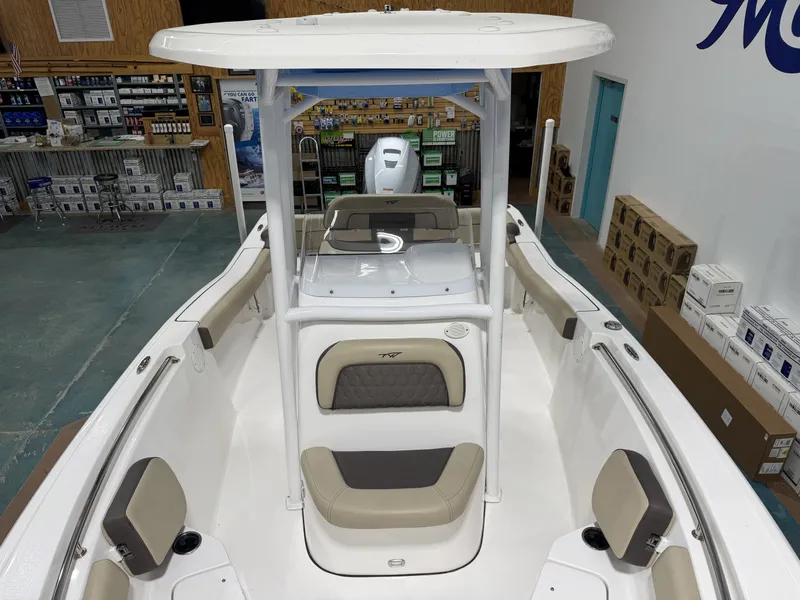 Slide: The Image of Interior view of a 2019 Tidewater 210 LXF boat in showroom. - 19
