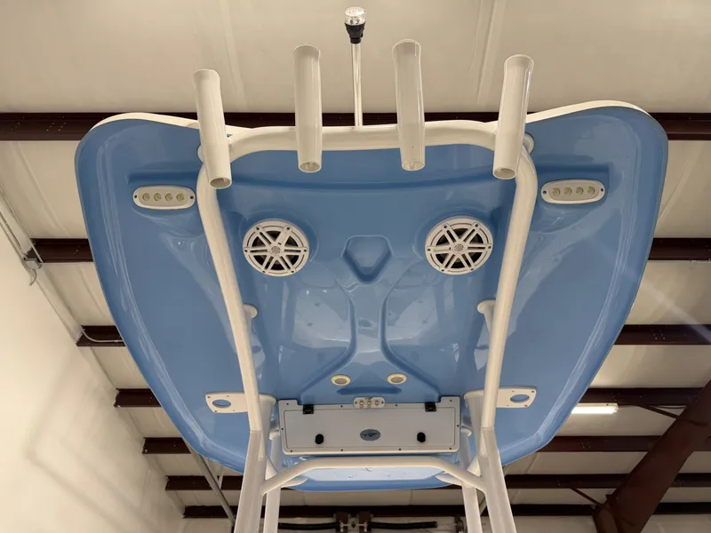 Slide: The Image of Underside of a blue 2019 Tidewater 210 LXF boat with speakers. - 20