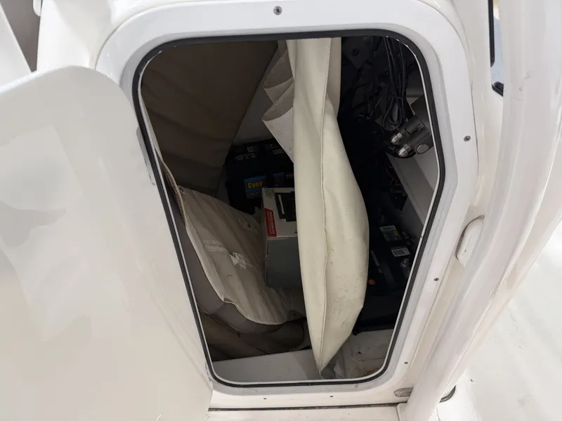 Slide: The Image of Interior of a 2019 Tidewater 210 LXF boat with storage area. - 23