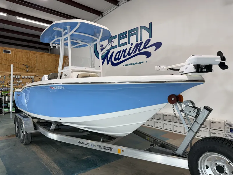 Slide: The Image of 2019 Tidewater 210 LXF boat on trailer in warehouse. - 9