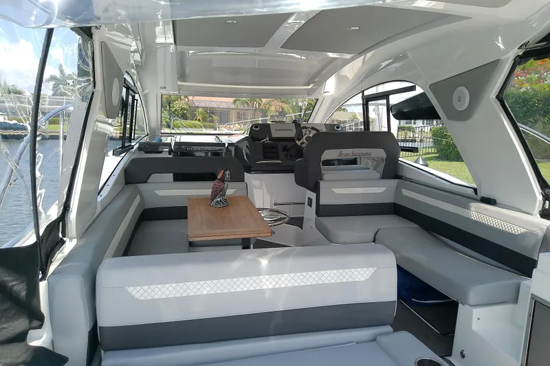 Slide: The Image of Interior of 2024 Beneteau Gran Turismo 36 yacht, featuring sleek seating and modern design. - 23