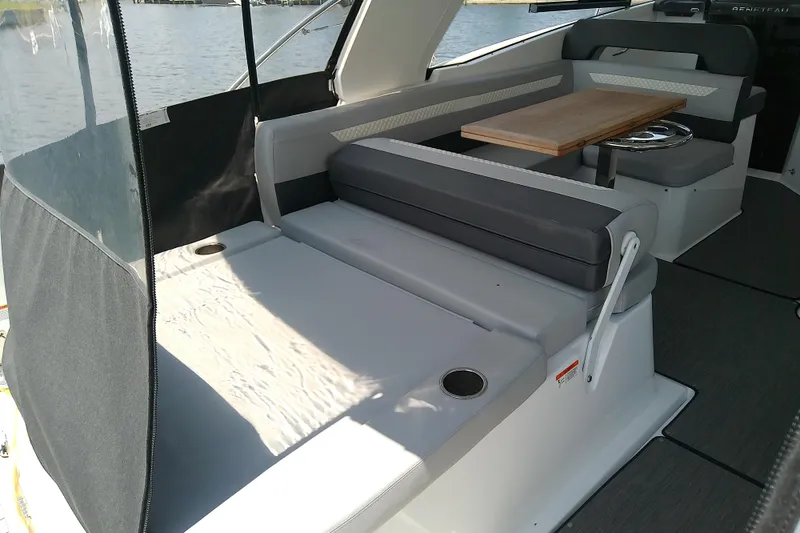 Slide: The Image of 2024 Beneteau Gran Turismo 36 interior with seating and table, featuring modern design. - 25