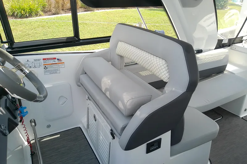 Slide: The Image of 2024 Beneteau Gran Turismo 36 interior with modern seating and steering wheel. - 41