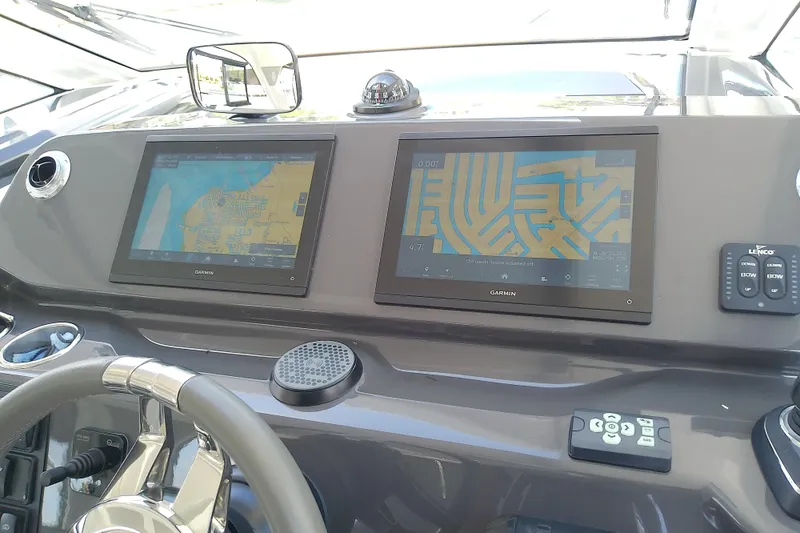Slide: The Image of Dashboard of 2024 Beneteau Gran Turismo 36 with dual Garmin navigation screens. - 45