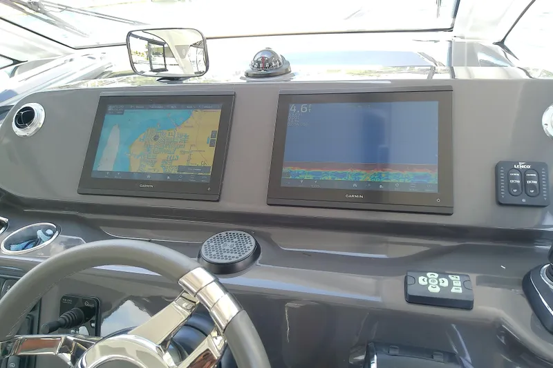 Slide: The Image of Dashboard of 2024 Beneteau Gran Turismo 36 with Garmin navigation displays. - 46