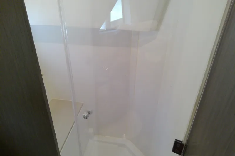 Slide: The Image of Shower area inside 2024 Beneteau Gran Turismo 36 yacht, featuring sleek modern design. - 78