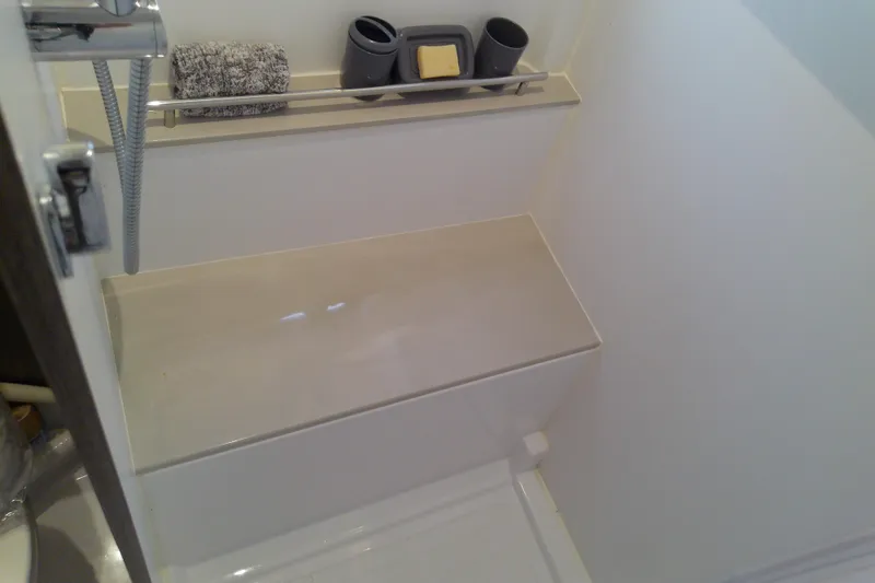 Slide: The Image of Shower area in 2024 Beneteau Gran Turismo 36 yacht, featuring modern fixtures and storage. - 79