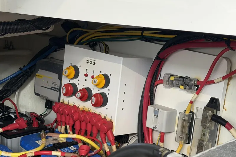 Slide: The Image of Electrical panel and wiring inside a 2024 Beneteau Gran Turismo 36 yacht. - 88