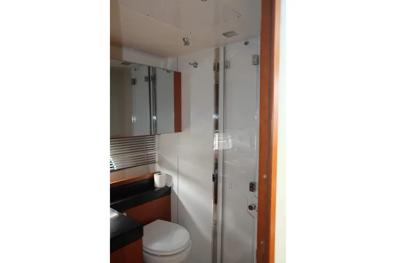 Slide: The Image of Luxurious bathroom in 2016 Prestige 500 yacht with modern fixtures and sleek design. - 49