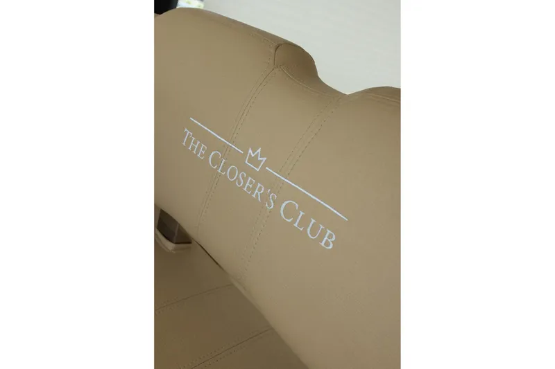 Slide: The Image of Beige seat with "The Closer's Club" logo, Prestige 500, 2016 model. - 58