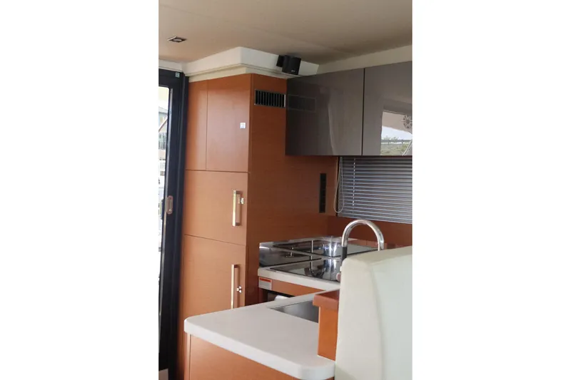 Slide: The Image of Modern kitchen interior of 2016 Prestige 500 yacht with sleek cabinetry and appliances. - 59
