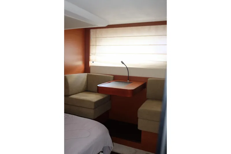 Slide: The Image of Interior of 2016 Prestige 500 yacht with cozy seating and modern table. - 65