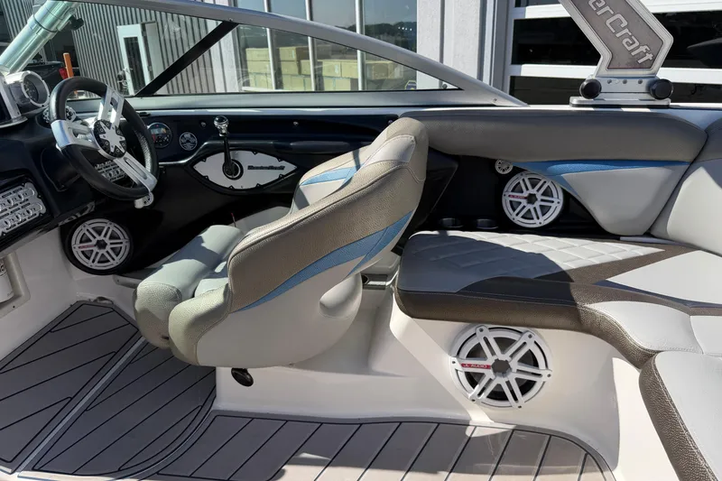 Slide: The Image of Interior of a 2010 MasterCraft XStar boat with modern seating and audio system. - 17