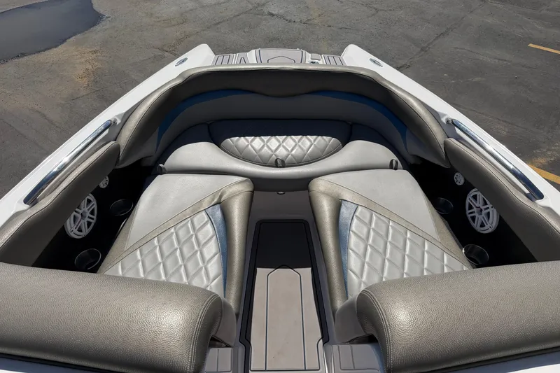 Slide: The Image of Luxurious interior of a 2010 MasterCraft XStar boat with diamond-stitched seating. - 19