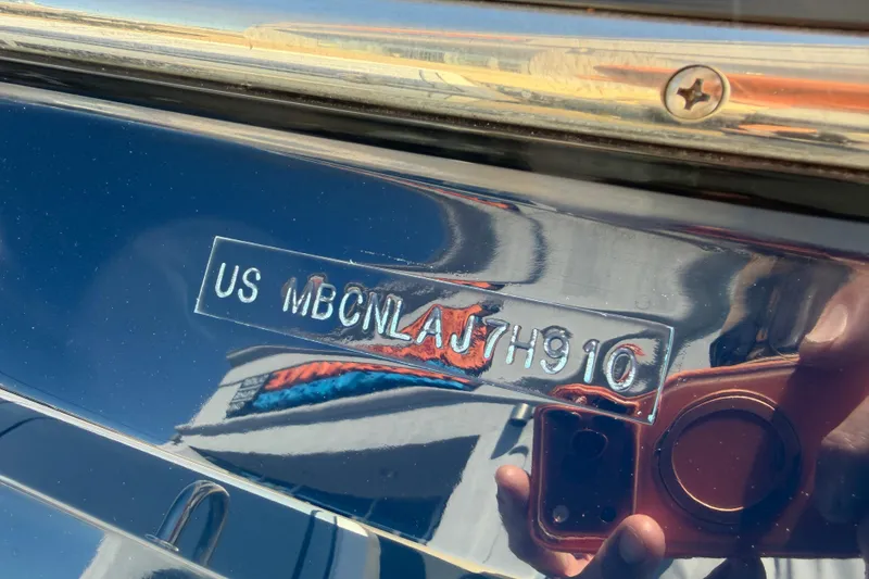 Slide: The Image of Hull identification number on a 2010 MasterCraft XStar boat. - 7
