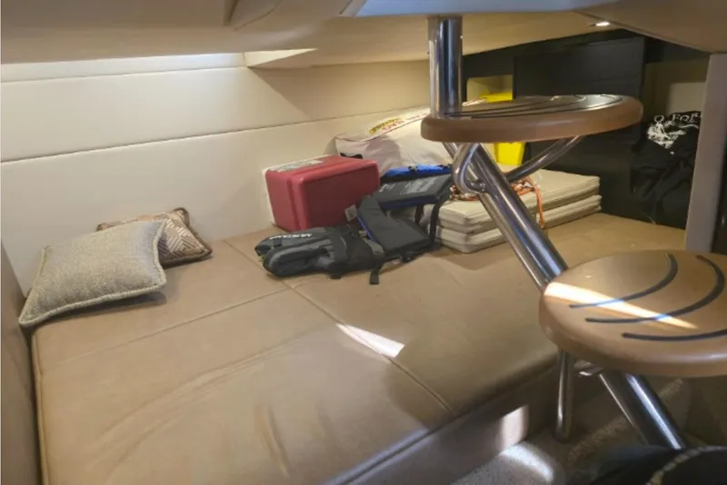 Slide: The Image of Interior cabin of a 2015 Formula 350 Crossover Bowrider I/O with seating and storage. - 19