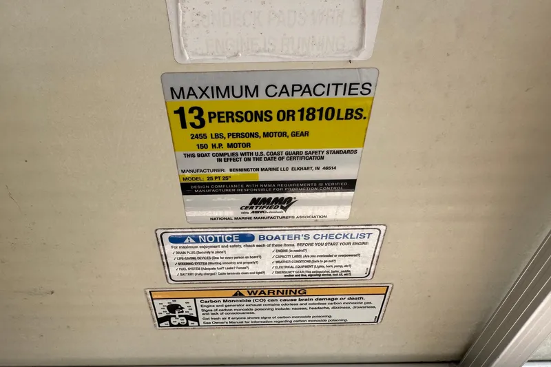 Slide: The Image of Maximum capacity label for 2007 Bennington 2574 GL boat, 13 persons or 1810 lbs. - 35