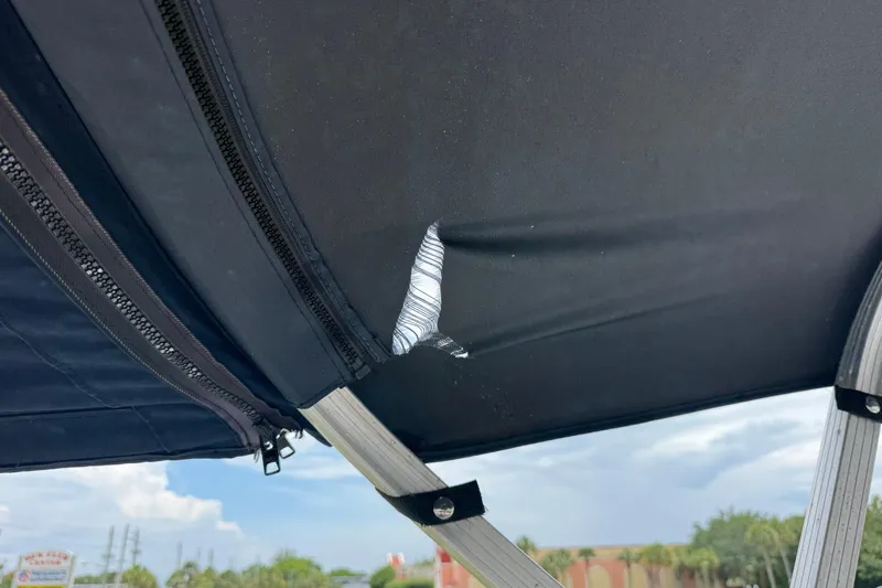 Slide: The Image of tear in main bimini top - 41