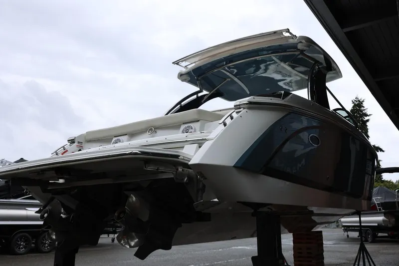 Slide: The Image of 2021 Cobalt R30 boat on display, showcasing sleek design and powerful engines. - 12