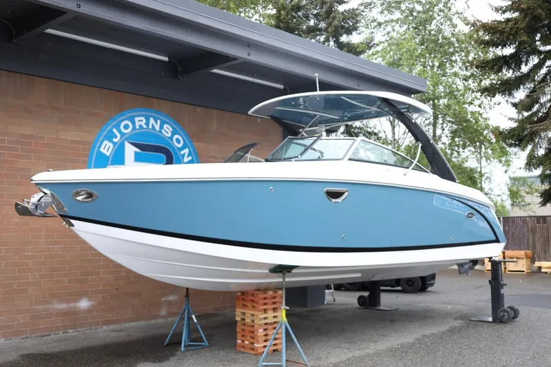 Slide: The Image of 2021 Cobalt R30 boat in blue, displayed at Bjornson facility. - 19