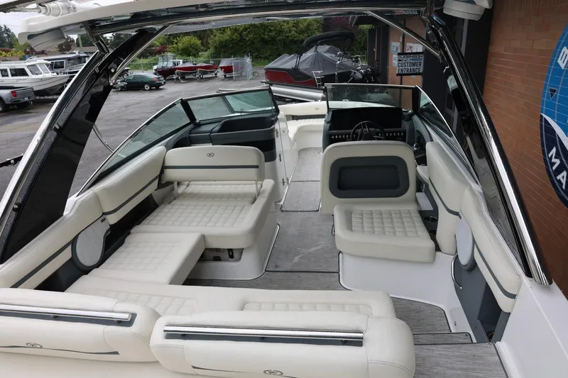 Slide: The Image of Luxurious interior of a 2021 Cobalt R30 boat with spacious seating and modern design. - 29