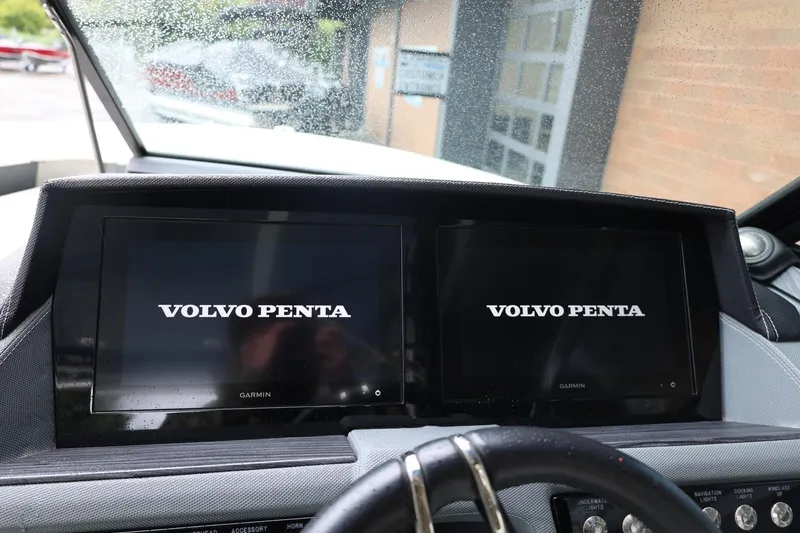 Slide: The Image of Dashboard of a 2021 Cobalt R30 boat featuring dual Volvo Penta displays. - 46
