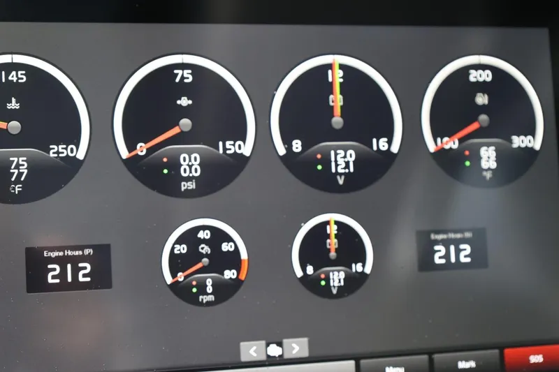 Slide: The Image of Dashboard gauges of a 2021 Cobalt R30 boat displaying engine metrics and temperatures. - 51